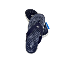 Navy blue sandals with white soles on a white background